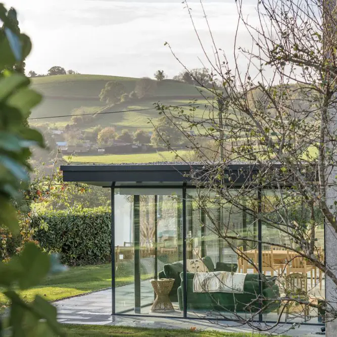 glass extension through the trees - crop